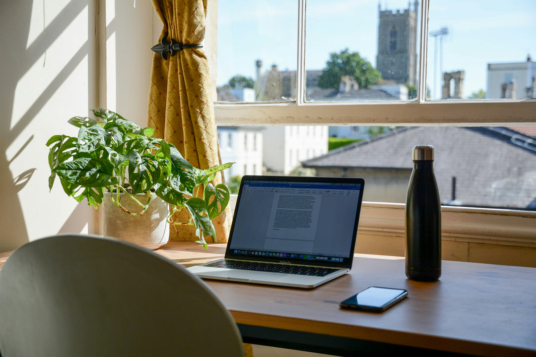 Laptop and mobile devices in a home workspace
